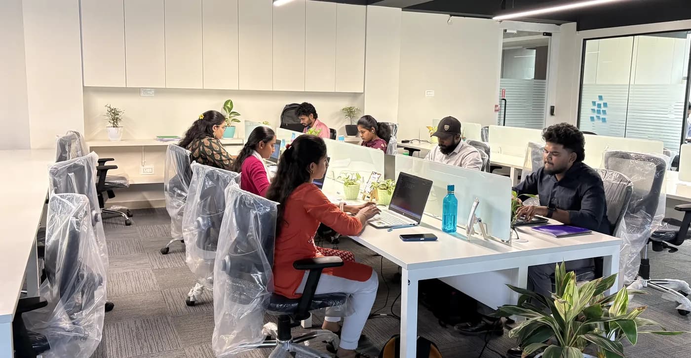 Developers working at their desks in the Brightnodes office